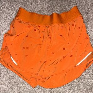 Orange lululemon shorts